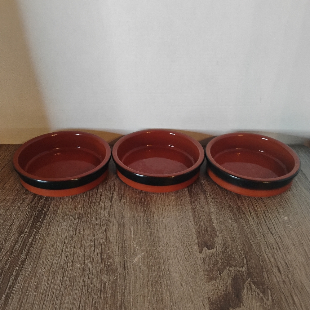 Set of Three Red and Black Ceramic Bowls